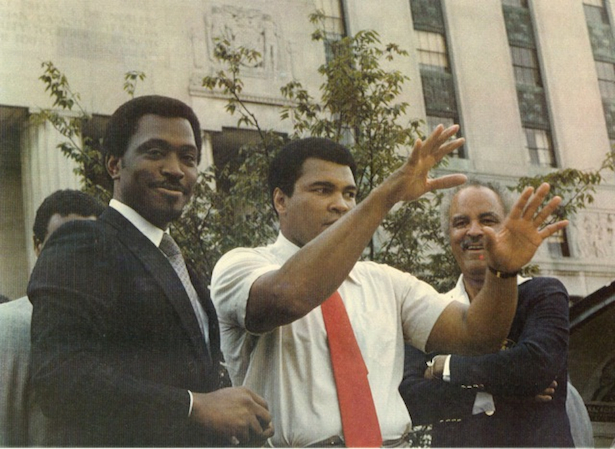 Amani Martin's father, Nathaniel Martin (L), next to Muhammad Ali. (Photo courtesy of Amani Martin)