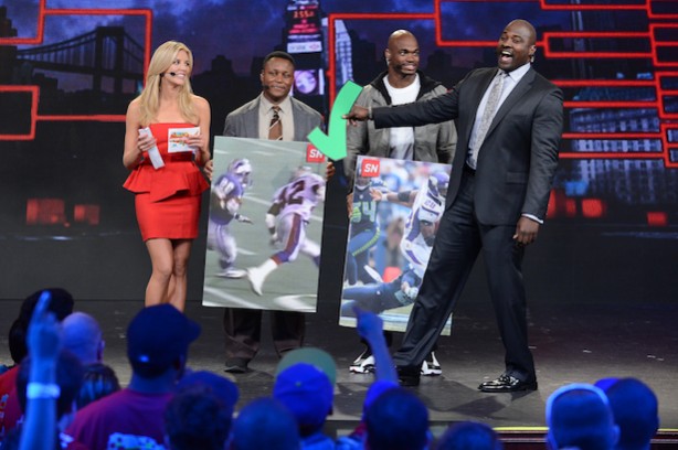 (L-R) Charissa Thompson, Barry Sanders, Adrian Peterson and Marcellus Wiley during the Madden Cover Reveal SportsNation episode in Times Square. (Rich Arden / ESPN Images)