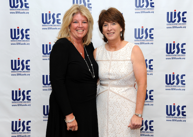 ESPN CFO and Executive Vice President Christine Driessen (L) with vice president of content program and integration for espnW Carol Stiff at the WISE Women of the Year Awards Luncheon. (Photo credit: Jennifer Pottheiser and WISE)
