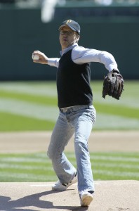Michael Keaton throws the ceremonial first pitch. (Photo courtesy of Rick Stewart/Getty Images)