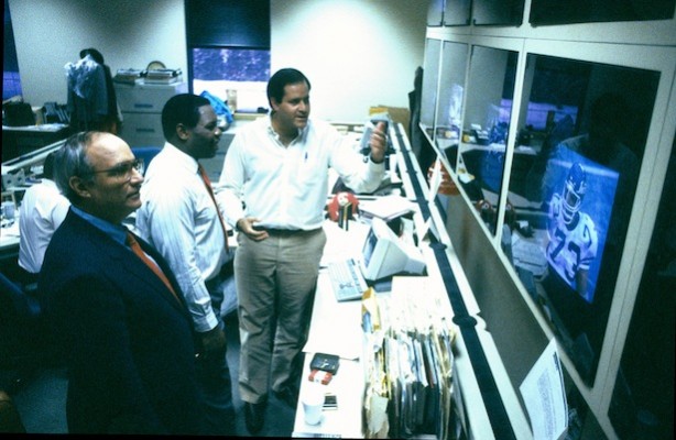 Pete Axthelm with Tom Jackson and Chris Berman taking in the Sunday games in ESPN’s Newsroom in 1987. Photo credit: Rick LaBranche 