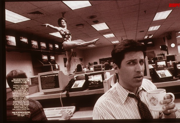 In a photo from a "This Is SportsCenter" spot, anchor Steve Levy reacts to a sudden appearance by Olympic gymnast Mary Lou Retton in the ESPN newsroom. (ESPN)