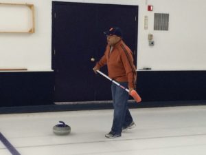 Mike Tirico gets his "curling" on with members of of the MNF family.