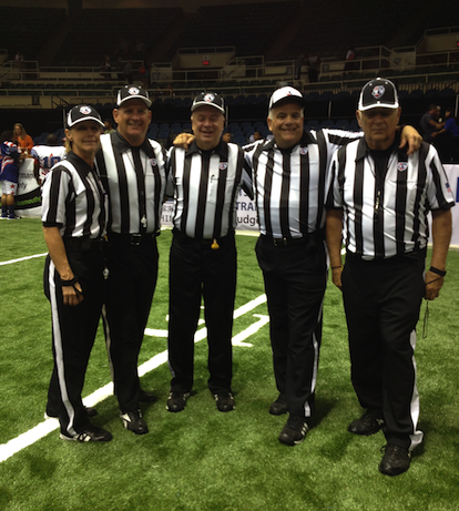 An active referee with the Arena Football League, ESPN's college football rules expert Dave Cutaia (second from right) officiated China's first AFL game last month in Beijing. (Photo courtesy of Dave Cutaia)