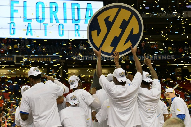 The Florida Gators celebrate winning the 2014 SEC Men's Basketball Tournament title. (Scott Clarke/ESPN Images)