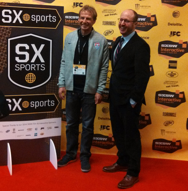 U.S. Men’s National Team manager Jurgen Klinsmann (left) and Roger Bennett (right), ESPNFC.com senior writer and co-producer of ESPN Films’ “Inside: US Soccer March to Brazil” series, share a laugh before announcing the series during a session at SXSW confab.