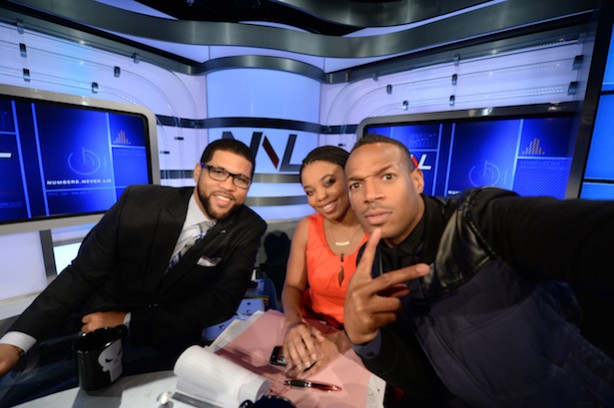 Michael Smith (l) and Jemele Hill on the Numbers Never Lie set with actor/comedian Marlon Wayans (Joe Faraoni / ESPN Images)