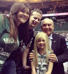 Dick Vitale with Lacey Holsworth and her parents Heather and Matt. (Photo courtesy of Dick Vitale)