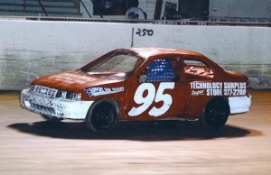 Trevor Gavin, competing in a mini-stock race car in the picture above, competed as a race car driver while in college. (Photo courtesy of Trevor Gavin)