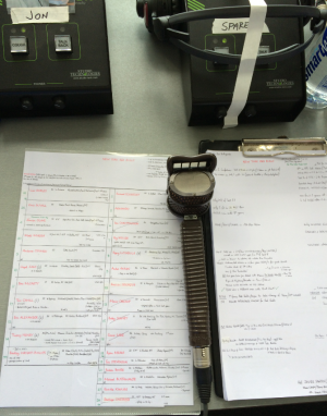The lip microphone resting on Jon Champion's match commentary notes ahead of the New York Red Bulls - Arsenal FC match on Saturday, July 26, at the Red Bulls Arena in Harrison, N.J (Mac Nwulu/ESPN)