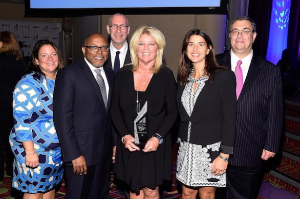 (L-R) VP Communications ESPN Katina Arnold, Chief Diversity Officer Walt Disney Company and Senior VP of HR ESPN Paul Richardson, President of ESPN and co-chairman of Disney Media Networks John Skipper, EVP and Chief Financial Officer ESPN and WICT Woman of the Year honoree Christine Driessen, VP espnW Laura Gentile and  EVP and Chief Technology Officer ESPN Chuck Pagano appear at the 2014 Women in Cable Telecommunications Touchstones Luncheon on September 15, 2014 in New York City.  (Photo by Larry Busacca/Getty Images for Women in Cable Telecommunications)