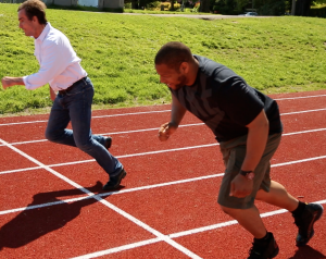 E:60 correspondent Bob Woodruff puts Ndamukong Suh's speed to the test in a 100 meter dash at Grant High School in Portland Oregon, on a track and football field donated by Ndamukong and his foundation. (photo by Dan Lindberg)