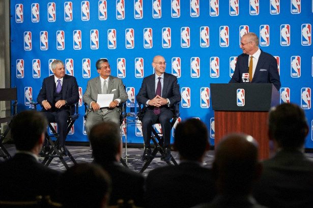 ESPN President John Skipper, at podium, addresses the media gathering regarding the new nine-year agreeement with the NBA. (Rich Arden/ESPN Images)