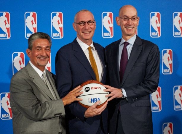 (L-R) Washington Wizards owner Ted Leonsis; ESPN President and Disney Media Networks Co-Chairman John Skipper; and NBA Commissioner Adam Silver celebrate the announcement of a nine-year rights agreement. (Rich Arden/ESPN Images)